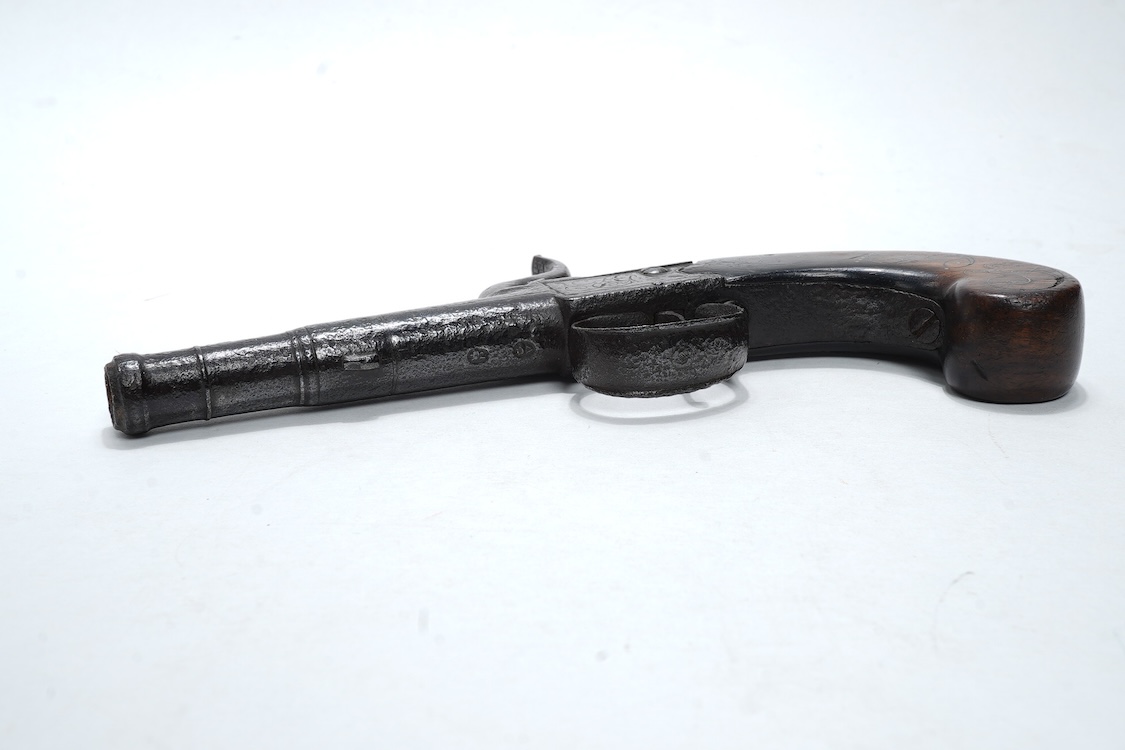 A boxlock percussion travelling pistol, with turn off cannon barrel, 5cm, and London proof marks, frame engraved; TG, with slab walnut grip with silver wire inlay